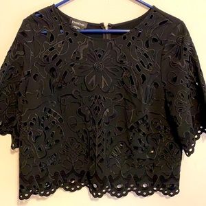 Beautiful eyelet fabric with elbow length sleeves.